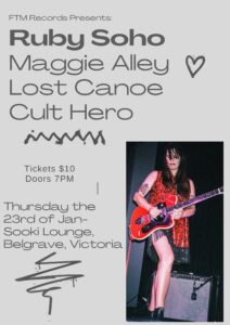 Ruby Soho Gig Poster. Grey background with charcoal colour writing. Picture in bottom righthand corner of Ruby playing a red guitar on stage. A very rock ’n’ roll image. 
