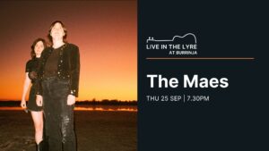 The Maes Burrinja banner. Left side is a photo of The Maes dressed mostly in black and brown standing on a dry lake bed with water in the background at sunset. The sky is yellow and red and reflected in the water. Black background on right side with white writing and live in lyre guitar graphic.